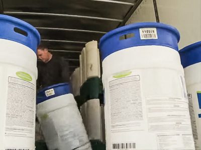 chemical drums on a truck with bar code tracking labels