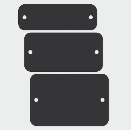 black anodized aluminum tags with two holes for attaching to equipment