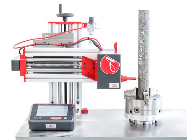 rotary marking system with chuck to hold parts vertically