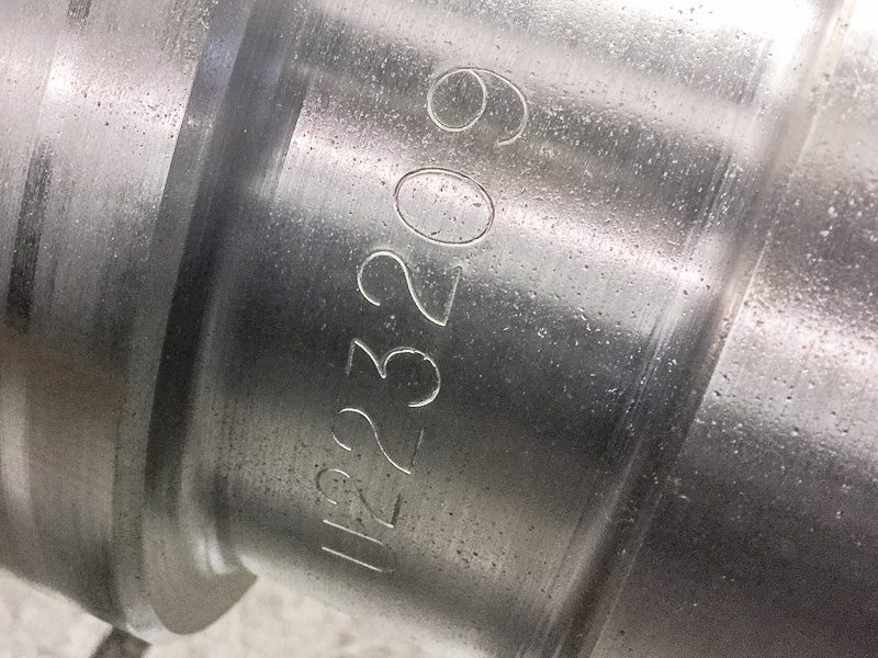 part number stamped around the circfumerence of steel roll