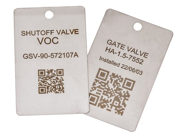 two stainless steel tags laser engraved with valve ID information and QR codes for CMMS compatibility