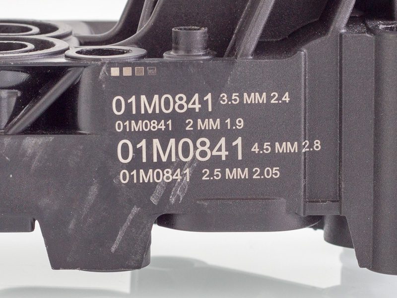 sample date codes marked on a plastic part with associated mark times