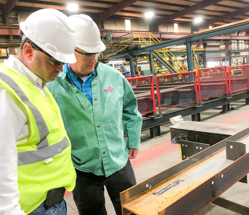 Pannier sales team members visiting a steel fabrication plant